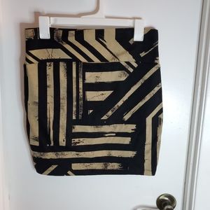 Black and tan mini skirt